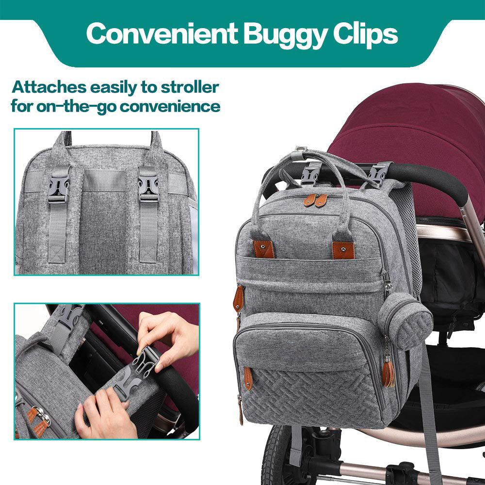Grey nappy bag backpack attached to stroller using convenient buggy clips