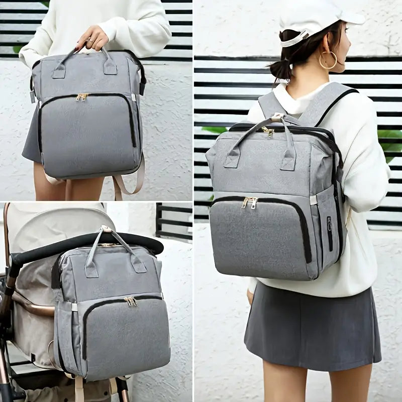 Waterproof black nappy bag backpack – 42×33×18 cm with stroller straps